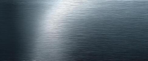 The shimmering metallic surface reflecting light in a unique abstract design photo