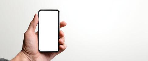 The smartphone held in hand ready for digital display and customization. photo