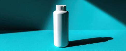 The white bottle casting a shadow on a vibrant blue background photo