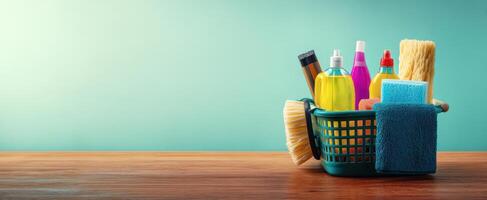 The collection of vibrant cleaning supplies in a stylish basket on a wooden surface. photo