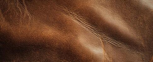 The intricate texture of high-quality brown leather material background. photo