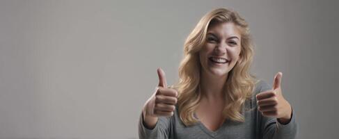 The cheerful woman giving thumbs up in a bright and positive setting. photo