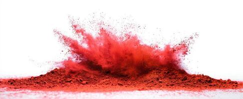 The stunning explosion of red powder creating an artistic visual spectacle. photo