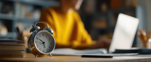 The clock highlighting the significance of time in a productive workspace. photo