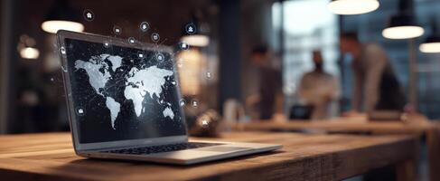 The laptop displaying a global map with digital connection symbols in an office setting. photo