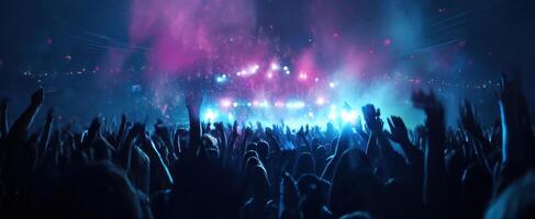 The vibrant atmosphere of a lively concert crowd enjoying the music. photo