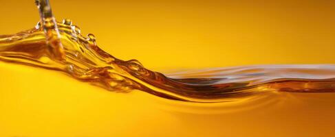 The beautiful golden wave of liquid captures light and movement exquisitely. photo