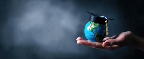 The globe adorned with a graduation cap symbolizes educational achievement and opportunity. photo