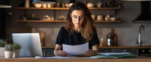 The woman reviewing important documents in a stylish modern workspace. photo