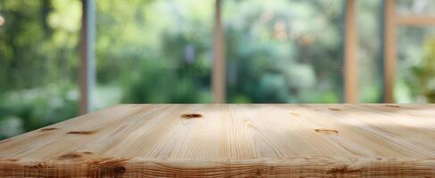 The wooden table offers a serene view of a natural green background. photo