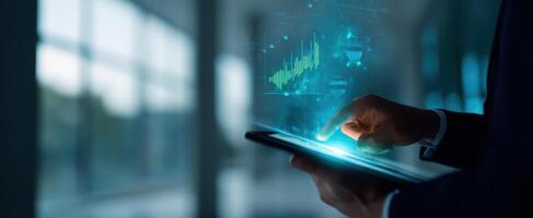 The tablet displaying financial data analytics in a modern office environment photo