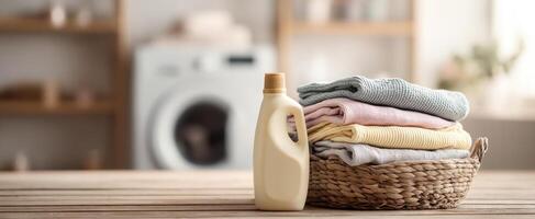 The stylish laundry setup with detergent and neatly folded towels. photo