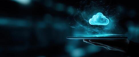 The futuristic cloud hologram displayed on a digital tablet in dark setting. photo