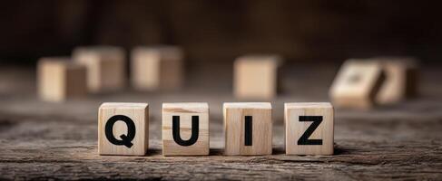 The wooden blocks spelling QUIZ on a rustic background. photo