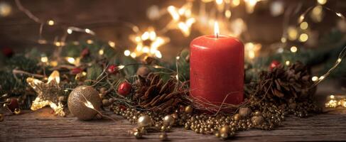 The Candle Surrounded by Festive Decor and Twinkling Christmas Lights. photo