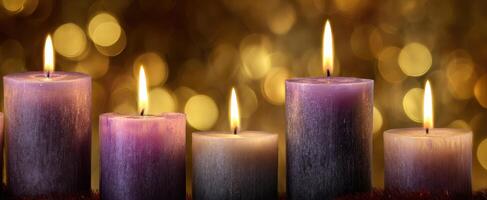 The tranquil glow of purple candles illuminating a festive background. photo