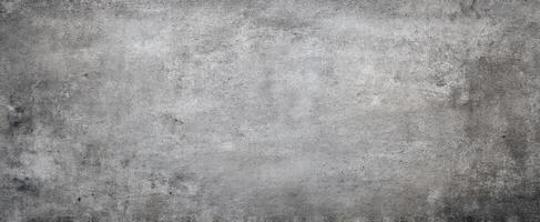 The textured gray concrete surface suitable for industrial design backgrounds. photo