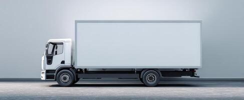 The modern delivery truck parked in a minimalist industrial space. photo