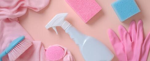 The Cleaning Supplies Arrangement on a Soft Pink Background photo