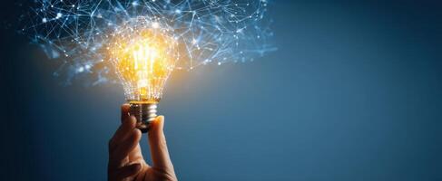 The glowing lightbulb illuminating creative technological ideas and innovation. photo