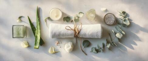 The serene arrangement of spa essentials and natural beauty products on a table photo