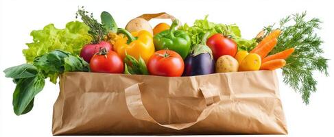 The vibrant assortment of fresh vegetables in a reusable shopping bag photo