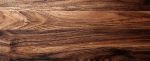 The rich and detailed texture of dark hardwood flooring surface. photo