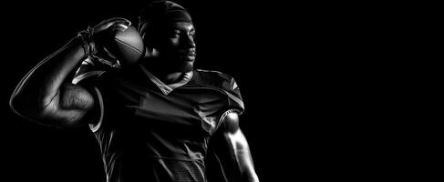 The confident football player preparing for an intense game moment. photo