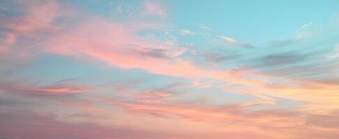 The breathtaking sky with pastel clouds during a tranquil sunset. photo
