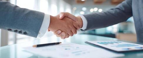 The handshake representing a successful business partnership and collaboration. photo