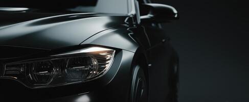 The black luxury car elegantly emphasizing its modern design and sleek features. photo