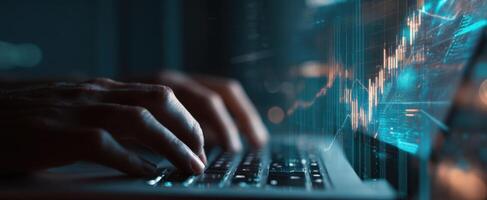 The Hands Typing on a Laptop with Financial Data and Graphs Displayed. photo