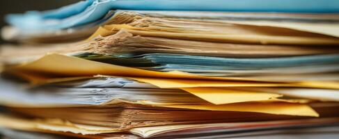 The Stack of Colorful Papers and Documents in a Busy Office Environment photo