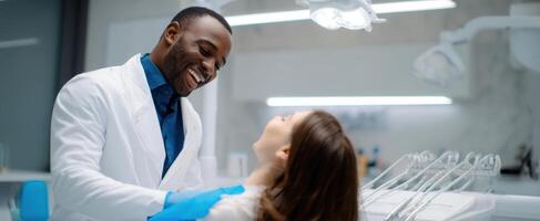 The dentist and patient sharing a joyful moment during a dental checkup session. photo