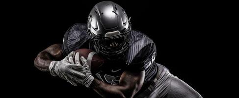 The dynamic football player in sleek armor preparing for action. photo