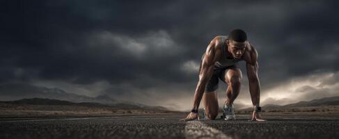 The athletic runner preparing for a sprint under dramatic cloudy skies. photo