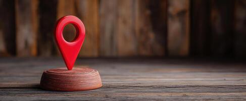 The Red Location Marker on a Wooden Base for Navigation and Mapping photo