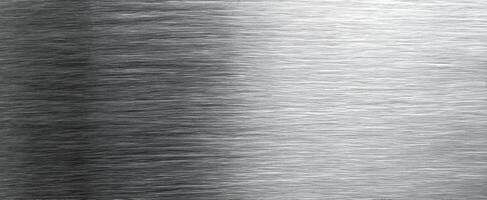The Brushed Silver Metal Surface with a Smooth Shiny Texture photo