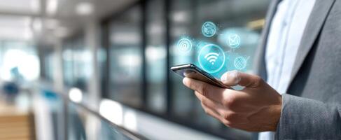 The businessman using futuristic smartphone with digital network icons photo