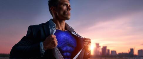 The businessman revealing a superhero identity under the sunset skyline photo