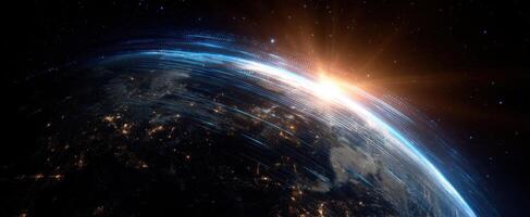 The digital sunrise over planet Earth with glowing data trails in space photo