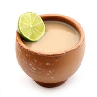 A close-up of a refreshing pulque, a fermented agave drink, with a milky and slightly sour flavor, photo