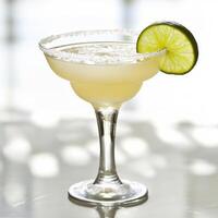 A margarita with a lime on top photo