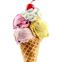 Three different flavors of ice cream in a waffle cone photo