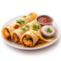A plate of chicken 65 roll, with chicken 65 pieces wrapped in a flaky paratha, with onions and photo