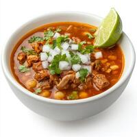 A bowl of traditional menudo, a Mexican soup made with tripe, hominy, and a flavorful broth, photo