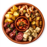 A platter of colorful tapas, including patatas bravas, gambas al ajillo, and chorizo al vino, photo