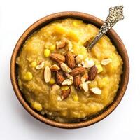 Pumpkin puree with almonds and cashews in a bowl photo