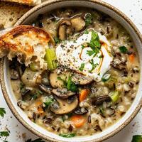 Wild rice soup with mushrooms and vegetables photo