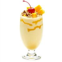A glass of mango milkshake, with a creamy blend of mangoes, milk, and ice cream, garnished with chopped nuts and a cherry, isolated on clean white background. photo